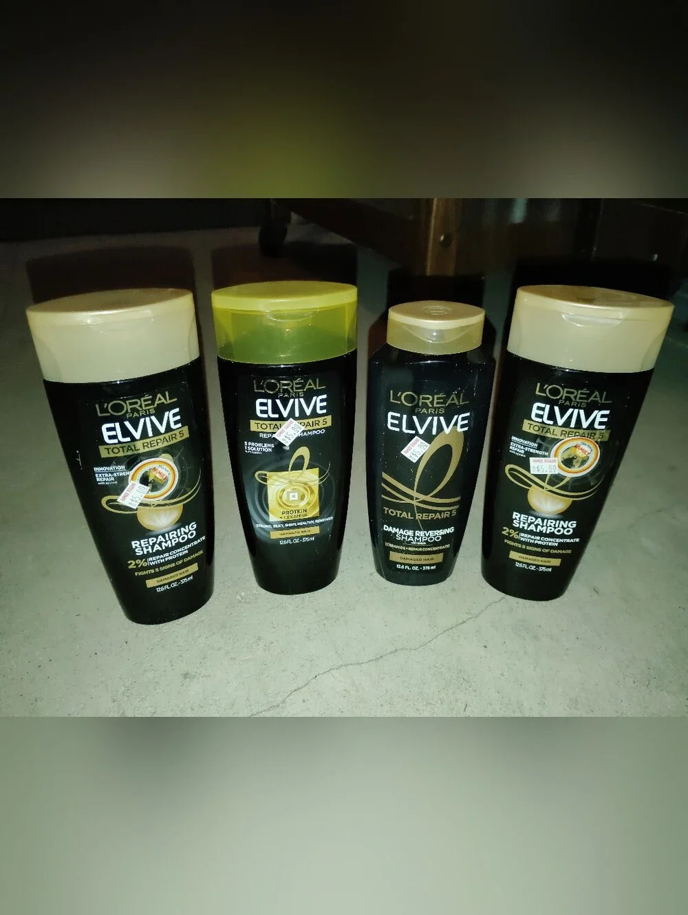 L'Oreal Elvive Repairing Shampoo - Black & Gold Set Of Four. Shampoo Bundle